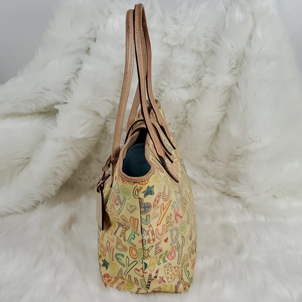 Dooney Bourke cream shoulder leather purse bag